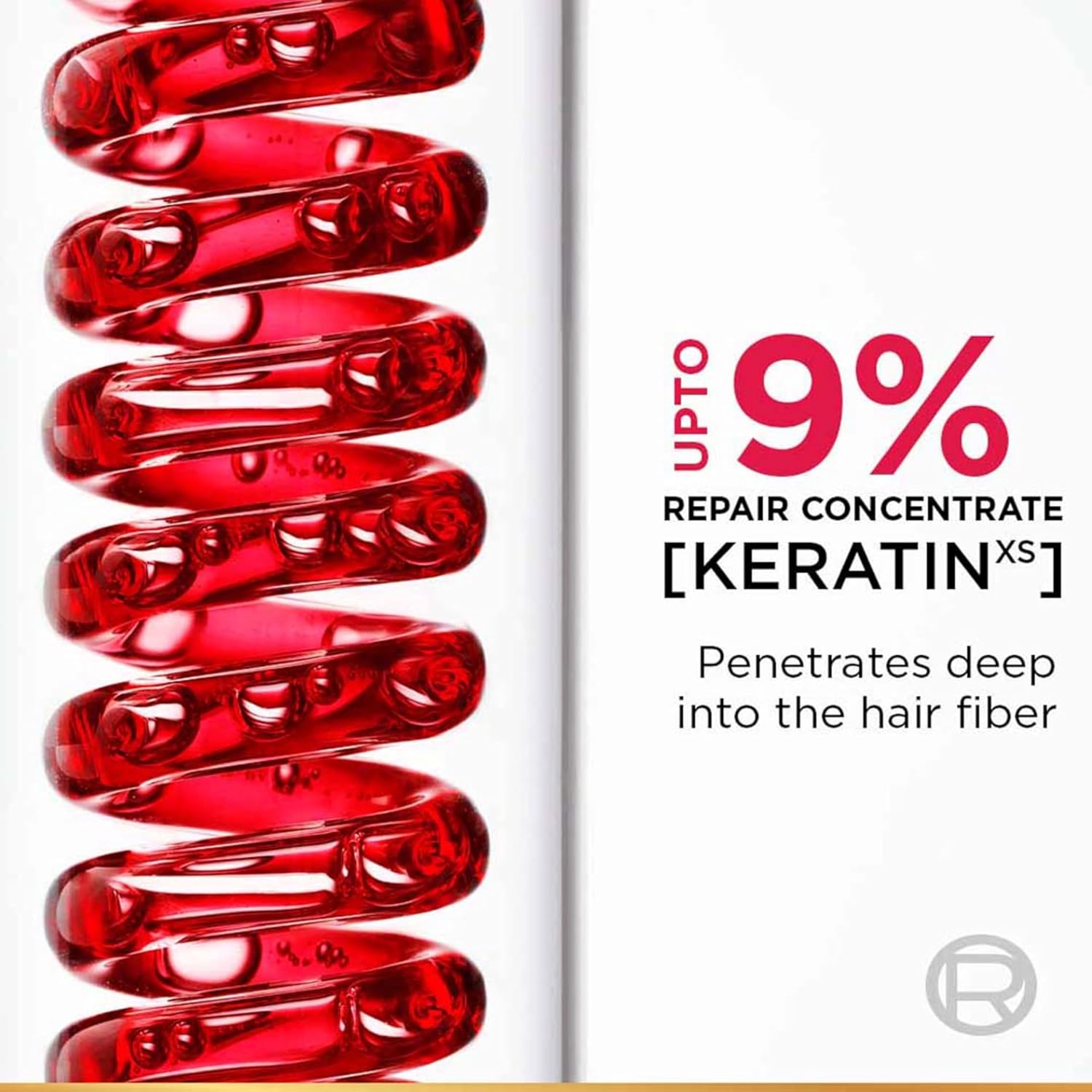 Red hair care product packaging with text about repair concentrate and keratin on a white background.
